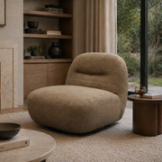 Sienna Oversized Swivel Chair In Boucle Amber